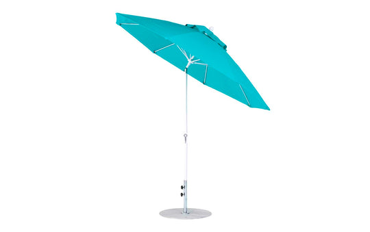 The Ledge Lounger Essential Fiberglass Umbrella, a teal 9 octagon with crank auto tilt, showcases marine-grade fabric, a robust metal pole, and round base. Its underside and support ribs are visible against a plain white background.