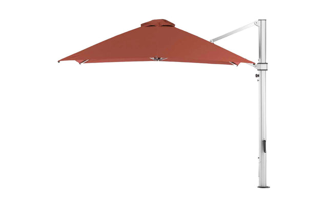 The Ultra Cantilever Umbrella by Ledge Lounger features a 10 square brown canopy, silver metal stand, and sleek outdoor umbrella light. Tilted open right side against a white background, it adds elegance to any patio setup.