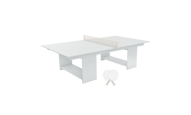 Enhance your outdoor entertainment with the Ledge Lounger Table Tennis Set. This sleek, minimalist design features a white table, net, two white paddles, and balls—all set against a simple white backdrop—ideal for any ping pong enthusiast.