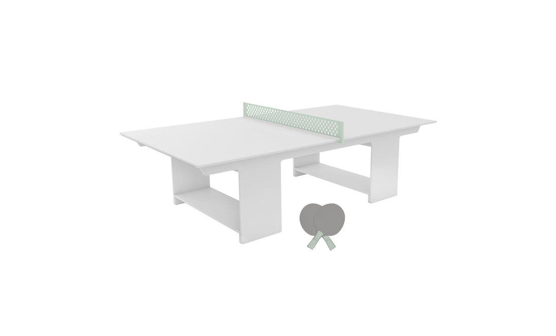 The Ledge Lounger Table Tennis Set showcases a modern, minimalist design with its white rectangular table and light green net. Ideal for outdoor fun, it includes two gray paddles placed in front, perfect for a lively game of ping pong.