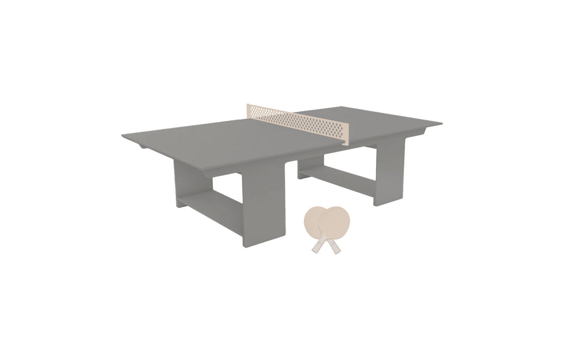 Enjoy outdoor fun with the Ledge Lounger Table Tennis Set. This gray miniature table includes a center net and comes with two white ping pong paddles crossed elegantly in front, ready for action.
