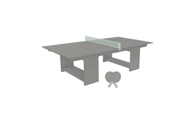 The Ledge Lounger Table Tennis Set features a minimalist gray table with a light green net and two gray paddles leaning against one of its legs, making it perfect for any outdoor entertainment setup.