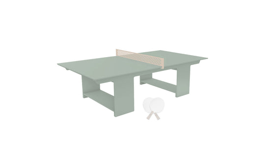 The Ledge Lounger Table Tennis Set, in minimalist green with a beige net, is perfect for outdoor fun. It features two white paddles and a ball upfront, showcasing its modern and simple design.