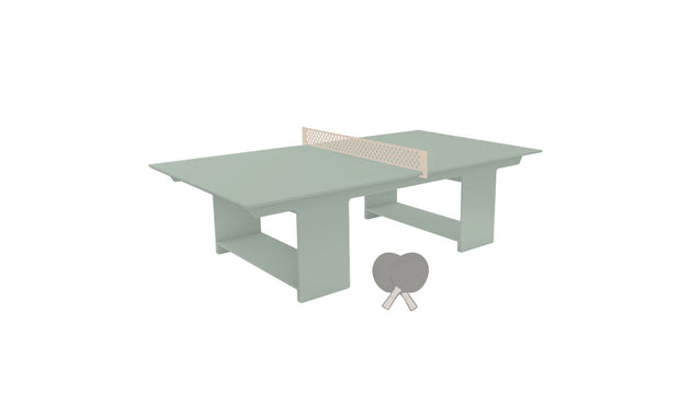The Ledge Lounger Table Tennis Set features a minimalist, light green design with a central net, two paddles, and a ball—perfect for contemporary outdoor fun.