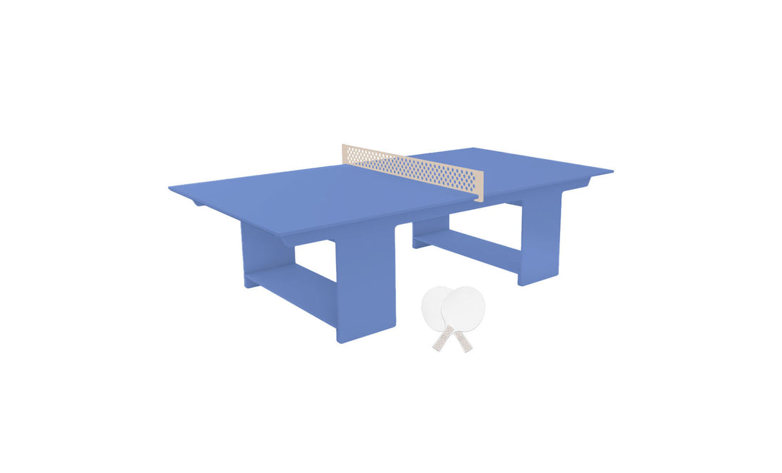 Ledge Loungers Table Tennis Set offers a minimalist, outdoor-ready blue table with a central net, two paddles with white handles, and two white balls alongside, perfect for embracing the ping pong spirit.