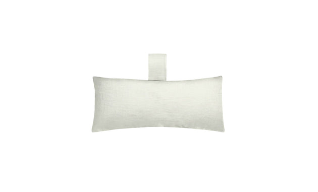 The Autograph Headrest Pillow by Ledge Lounger is a simple white rectangular pillow with a smooth texture and a short vertical tab at the top center, set against a plain white background. Final Sale item.