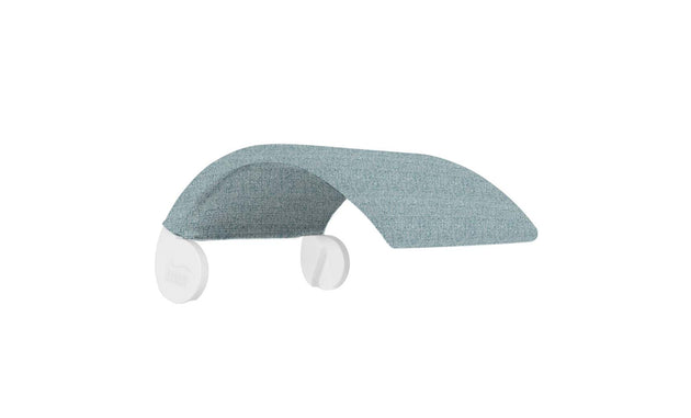 The Signature Chair Shade by Ledge Lounger is a light teal fabric canopy for loungers. It attaches with two rounded clips to a white plastic base, forming an arch for a modern, minimalist look perfect for in-pool tanning ledges.
