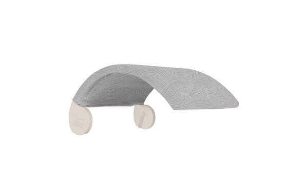 A gray structured fabric canopy with a swirling design, held by two cylindrical wooden bases, provides a modern minimalist look reminiscent of the Ledge Lounger Signature Chair Shade.