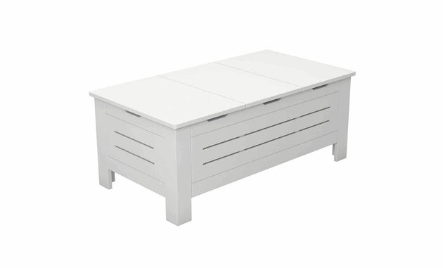 The Mainstay Storage Coffee Table by Ledge Lounger is a white, rectangular wooden bench ideal for outdoor living spaces. It features slatted sides and a solid hinged top that opens for storage. With four sturdy legs, its minimalist style complements any setting effortlessly.