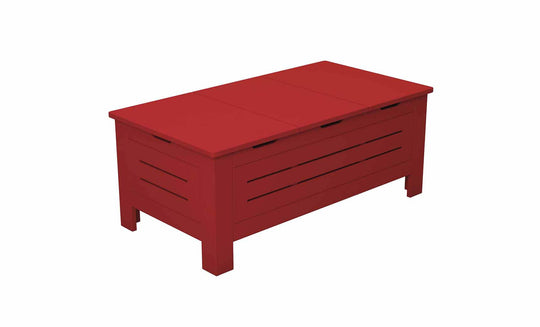 The Ledge Lounger Mainstay Storage Coffee Table is a red wooden chest with a slatted front, sturdy legs, and flat lid. Ideal for outdoor spaces, it offers stylish storage and abundant space for your treasures.