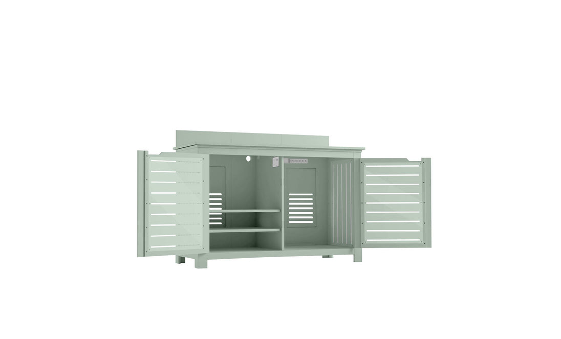 The Mainstay Bar Credenza by Ledge Lounger, in light green, features open double doors revealing ample storage space with two shelves on the left and an open compartment on the right. Its slatted design makes it perfect for outdoor entertainment settings.