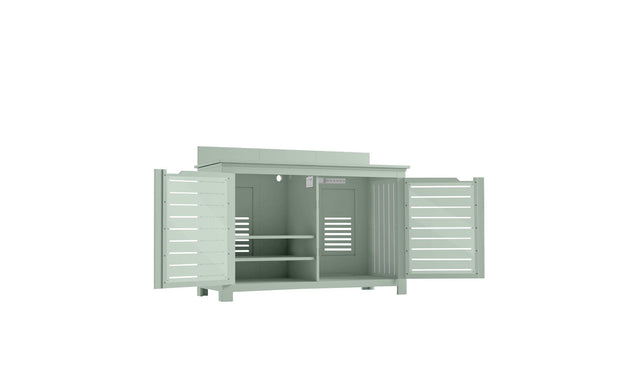 The Mainstay Bar Credenza by Ledge Lounger, in light green, features open double doors revealing ample storage space with two shelves on the left and an open compartment on the right. Its slatted design makes it perfect for outdoor entertainment settings.
