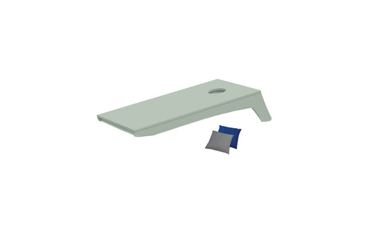 The Ledge Lounger Cornhole board, in green with a circular hole, rests on a white background. This portable set includes one blue and one gray bean bag, ideal for an impromptu game on the go.