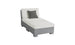 The Ledge Lounger Signature Sectional 2 Piece Sun Chair is a modern gray and white chaise lounge, featuring a dark gray accent pillow. It offers superior relaxation with its cushioned backrest and seat crafted from durable materials, supported by a sturdy base on a plain white background.