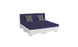 The Signature Sectional 4 Piece Sun Chair by Ledge Lounger features a white modular pallet sofa with navy blue cushions and two gray throw pillows. Ideal for relaxation, it can be configured into a spacious seating area or a bed-like setup against a white backdrop.