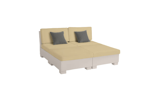 The Signature Sectional 4 Piece Sun Chair by Ledge Lounger is a beige modular sofa with spacious seating, two sections, two beige back cushions, and two gray throw pillows. Its short, sturdy legs enhance its minimalist design, perfect for relaxation.