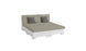 The Ledge Lounger Signature Sectional 4 Piece Sun Chair offers spacious seating and relaxation with a beige modular design and two gray throw pillows. It features a white base with square legs, set against a light background, emphasizing its contemporary style and dual functionality.