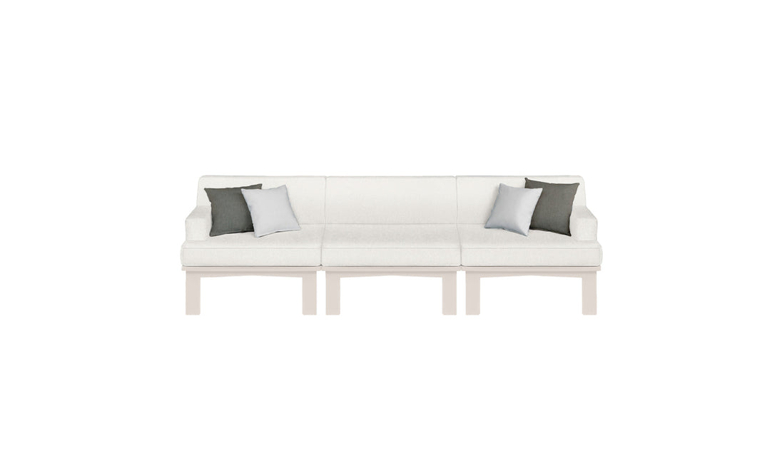 The Ledge Lounger Mainstay Sectional 3 Piece Sofa, with a modern white design and wooden legs, adds style to outdoor spaces. It includes two dark gray pillows and one light gray pillow, all set against a plain white background.
