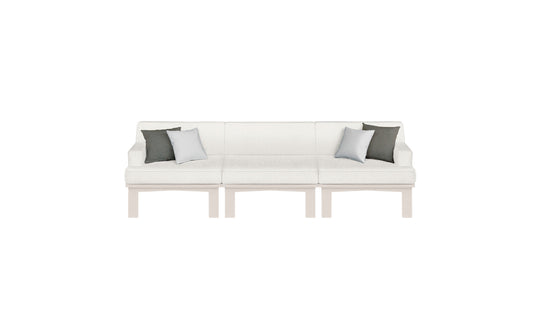 The Ledge Lounger Mainstay Sectional 3 Piece Sofa, with a modern white design and wooden legs, adds style to outdoor spaces. It includes two dark gray pillows and one light gray pillow, all set against a plain white background.