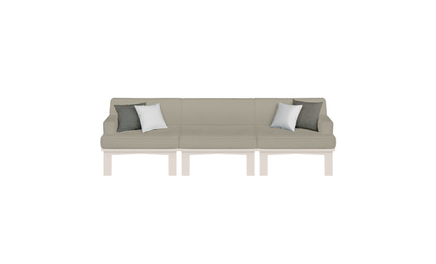 The Mainstay Sectional 3 Piece Sofa by Ledge Lounger, ideal for outdoor spaces, boasts light green upholstery and includes two gray and white accent pillows. Its minimalist design with clean lines and simple wooden legs makes it perfect for your patio or garden.