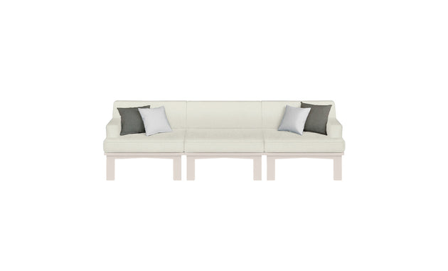 The Ledge Lounger Mainstay Sectional 3 Piece Sofa features a cream tone, minimalist style, and sleek light wood legs. With dark/light gray accent pillows on each end, its perfect for enhancing your outdoor space.
