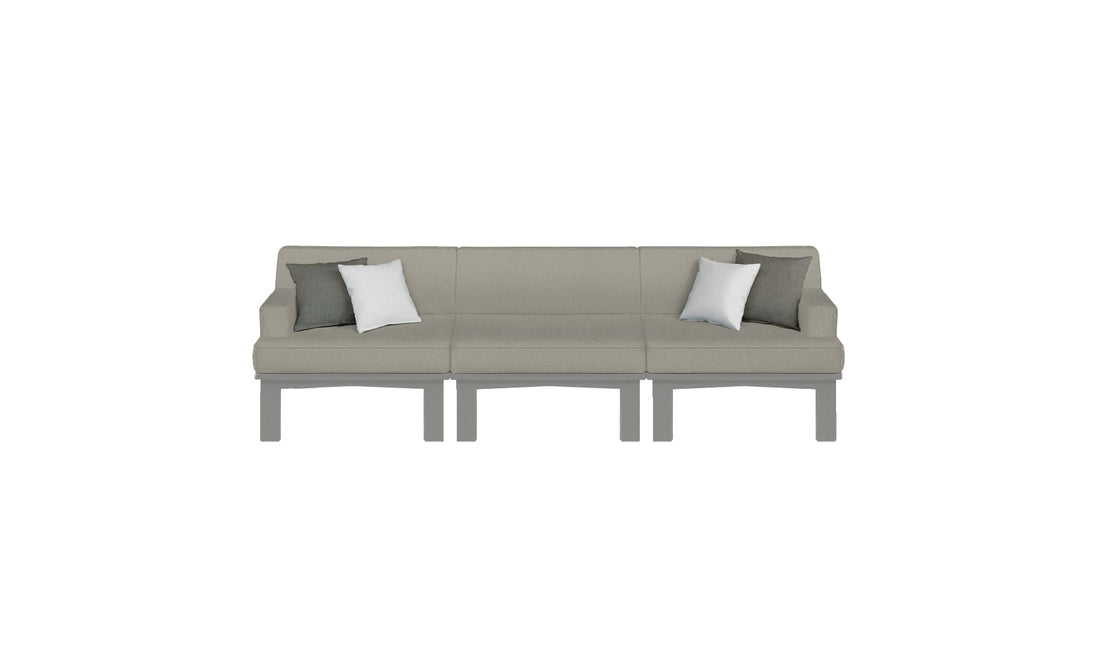 The Mainstay Sectional 3 Piece Sofa by Ledge Lounger is a minimalistic grey sectional with three sections, featuring two decorative pillows—one grey and one white—on each end, set against a plain white background.