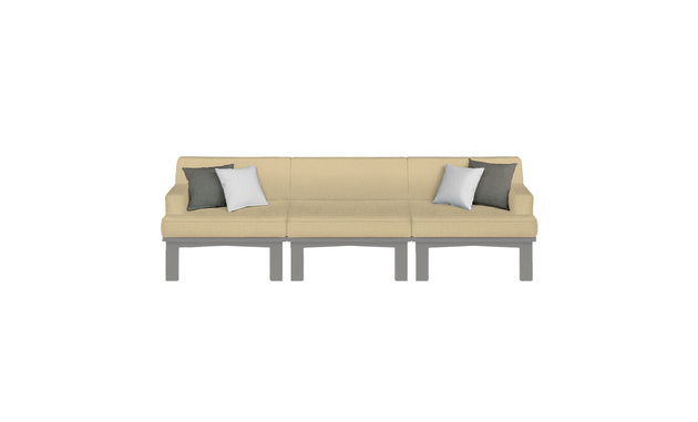 The Ledge Lounger Mainstay Sectional 3 Piece Sofa, with beige fabric and grey legs, features three grey and two white square cushions. Its design is highlighted against a white background, making it a perfect addition to any outdoor space, enhancing your patios ambiance.