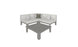 A minimalist Mainstay Sectional 4 Piece Diamond by Ledge Lounger features light cushions and cozy corner pillows—two white and one dark—beside a square gray coffee table, all on a white backdrop.
