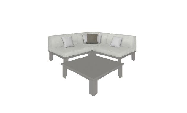 The Mainstay Sectional 4 Piece Diamond by Ledge Lounger in gray forms a cozy corner with two white and one dark gray cushion against a blank background, complemented by a matching rectangular coffee table for an inviting setup.