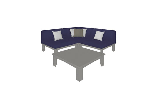 The Mainstay Sectional 4 Piece Diamond by Ledge Lounger, in navy blue, forms a cozy L-shaped corner with three white and one gray pillow. A gray coffee table sits in front of the sofa on a white background.