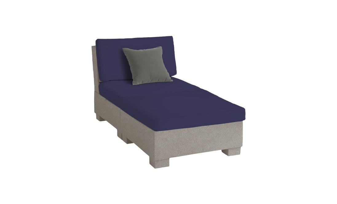 The Signature Sectional 2 Piece Sun Chair by Ledge Lounger features a gray upholstered chaise lounge with dark blue cushions and a gray throw pillow. Crafted from durable materials, it boasts a simple, modern design with four square legs, perfect for casual or contemporary settings.