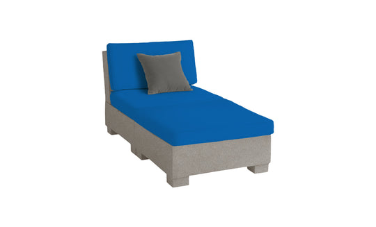 The Signature Sectional 2 Piece Sun Chair by Ledge Lounger is a modern chaise lounge in durable materials, featuring a gray base with bright blue cushions and a smaller gray pillow, all set against a clean white backdrop for optimized relaxation.