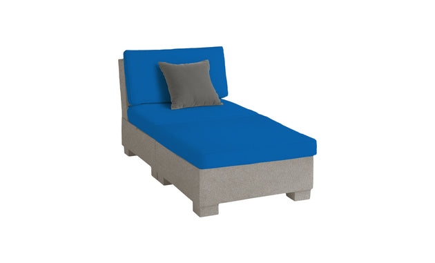 The Signature Sectional 2 Piece Sun Chair by Ledge Lounger is a modern chaise lounge in durable materials, featuring a gray base with bright blue cushions and a smaller gray pillow, all set against a clean white backdrop for optimized relaxation.