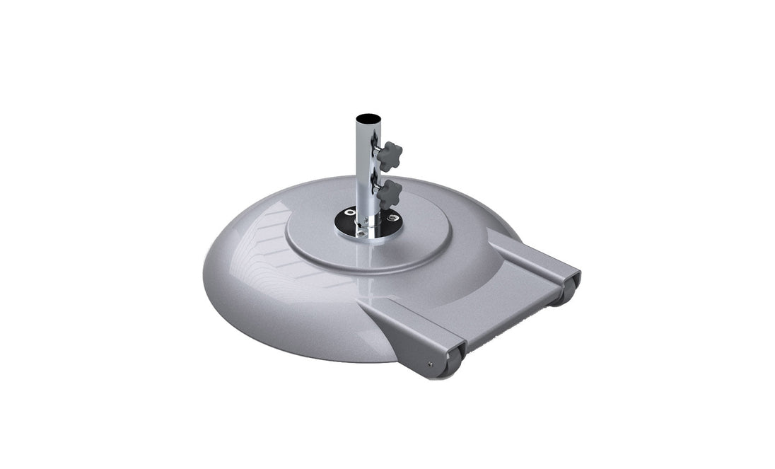 The Ledge Lounger Aluminum Umbrella Base is a silver, circular, powder-coated aluminum stand with an adjustable pole holder and a sleek, flat surface. It features two wheels for easy mobility and added umbrella stability.