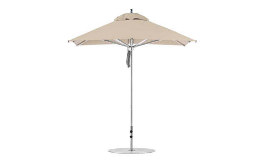 The Ledge Lounger Premier Aluminum Umbrella - 7.5 Square Pulley features a sturdy silver pole with a beige top and round base. Its vented design allows airflow, and its marine-grade fabrics enhance durability, making it wind-resistant and perfect for outdoor use.