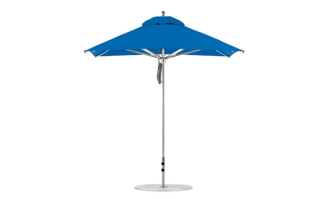 The Ledge Lounger Premier Aluminum Umbrella (7.5 Square Pulley) features a vented top and sturdy aluminum pole with a flat circular base, crafted from wind-resistant, marine-grade fabrics.