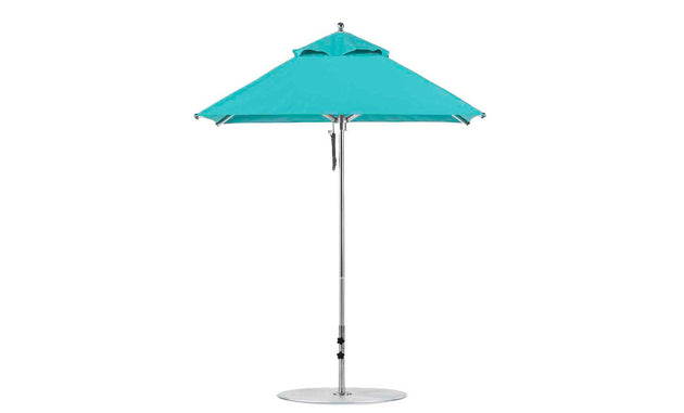 The Ledge Lounger Premier Aluminum Umbrella, featuring a sleek aluminum pole and round silver base, is crafted with marine-grade fabrics for a wind-resistant, durable design. This 6.5 square pulley umbrella has an open flat top, perfect for outdoor use.