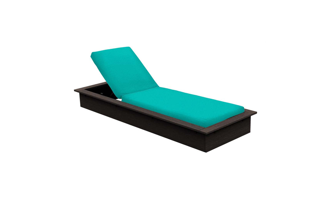 The Echo Chaise by Ledge Lounger, featuring turquoise cushions and an angled backrest on a dark wooden base, is set against a plain white background—ideal for enhancing any outdoor space.