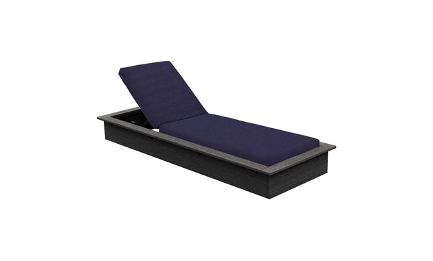 The Echo Chaise by Ledge Lounger features a dark gray frame and navy blue cushion, ideal for outdoor spaces. Its adjustable backrest offers comfortable reclining. The sleek design stands out against a white background.