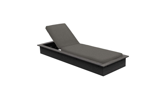 The Echo Chaise by Ledge Lounger, a dark gray chaise lounger with an adjustable backrest and a cushioned seat, is shown against a white background, ideal for adding style and comfort to any outdoor area.
