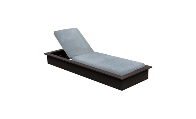 The Echo Chaise by Ledge Lounger features a sleek, dark wooden frame and light gray cushioned seat and back. Its slightly reclined backrest adds style and comfort, making it perfect for relaxing in any outdoor space.