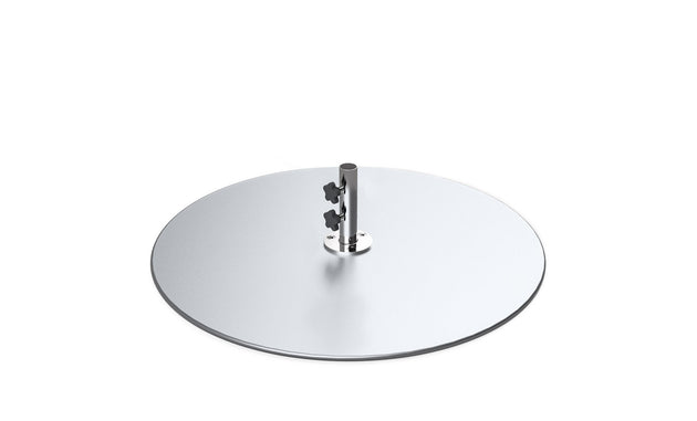 A metallic disc, the Galvanized Steel Stack Umbrella Base by Ledge Lounger, boasts a central pole with two black adjustment knobs, ensuring snug fitting for your umbrella. The reflective base is beautifully set against a plain white background.