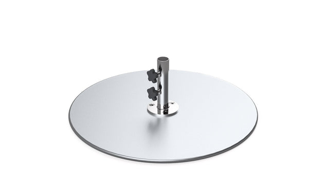 The Ledge Lounger Galvanized Steel Stack Umbrella Base has a round design with a central vertical support rod featuring two black adjustable knobs. Its smooth, reflective surface and minimalist design are perfect for center pole umbrellas with traditional compatibility.