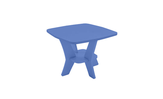 A compact blue side table from Ledge Loungers Mainstay collection, featuring a square top and elegant curved legs. Final sale item.