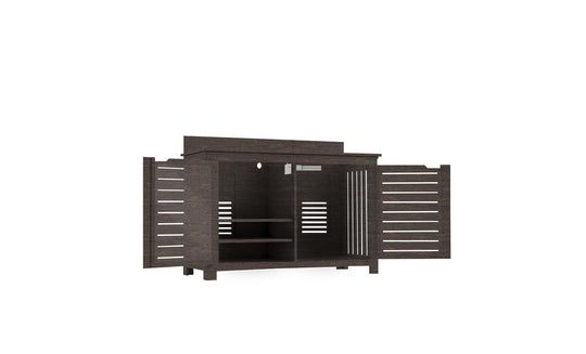 The Mainstay Bar Credenza by Ledge Lounger features slatted doors, a dark finish, and flat top. Inside, it offers two shelves on one side and an open space on the other, perfect for storage or display. Final sale item.