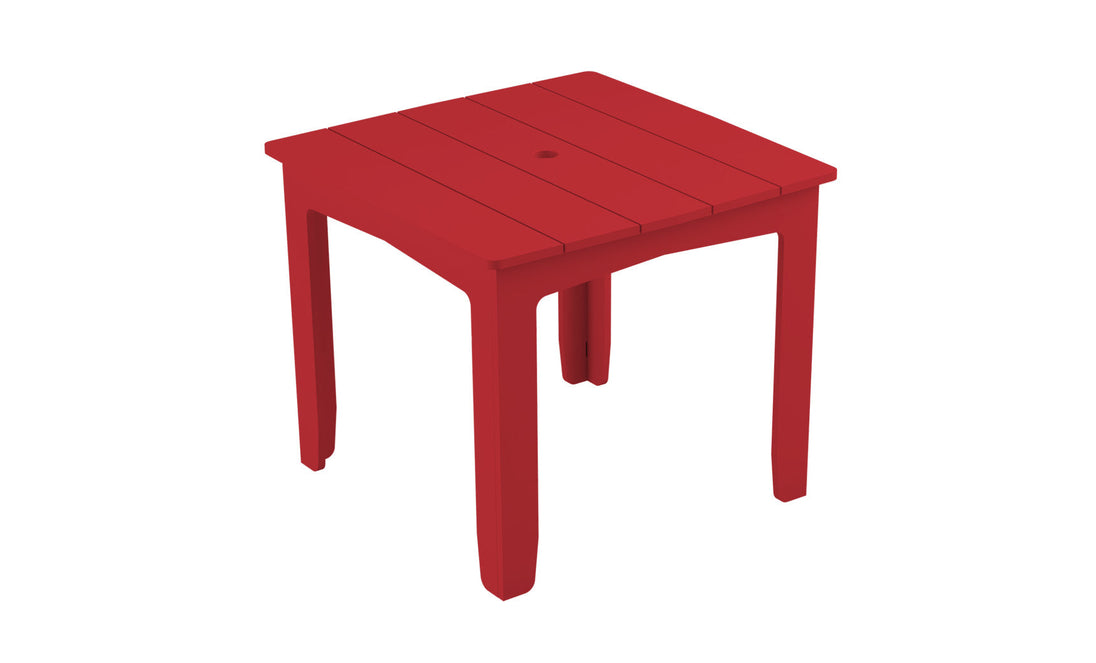The Mainstay Square Dining Table by Ledge Lounger is a compact, red plastic dining table with a slatted top and four sturdy legs. Designed for outdoor use, it includes a central umbrella sleeve to provide shade and comfort.