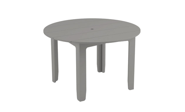 The Mainstay Round Dining Table by Ledge Lounger is a stylish gray outdoor table with four sturdy legs and a central umbrella sleeve, ideal for alfresco dining.