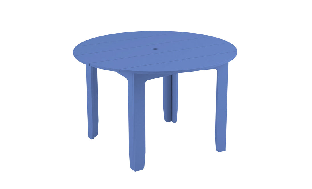 The blue, round Mainstay Dining Table by Ledge Lounger has four straight legs and an umbrella sleeve, perfect for outdoor dining. Set against a white background, its ideal for al fresco meals.
