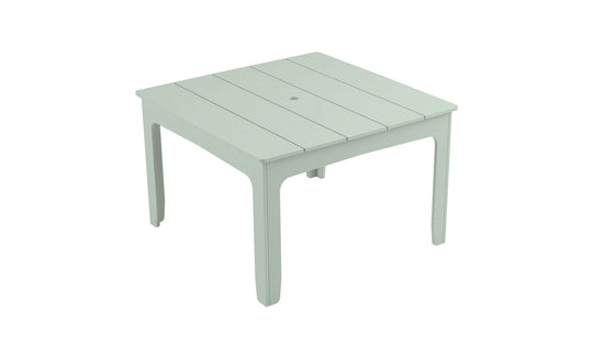 The Mainstay Square Dining Table by Ledge Lounger is a simple, square, white plastic outdoor table with four legs and a slatted top, featuring a built-in central umbrella sleeve—ideal for alfresco gatherings.