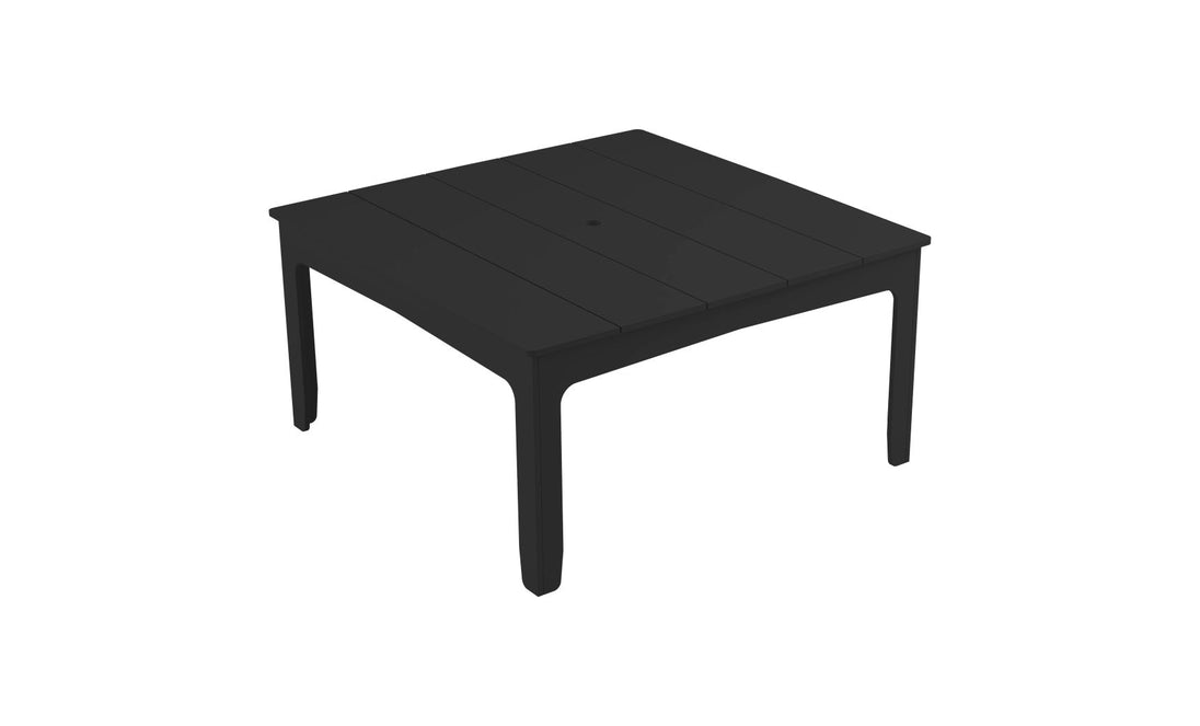 Introducing the Mainstay Square Dining Table by Ledge Lounger, a sleek black outdoor piece perfect for al fresco dining. With a simple design and slatted pattern tabletop featuring an umbrella sleeve, it features four straight legs. The clean look is complemented by its plain white background.